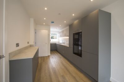 Interior photo of a kitchen in a house at Tutton’s Rise, a five-home development from Karm Homes